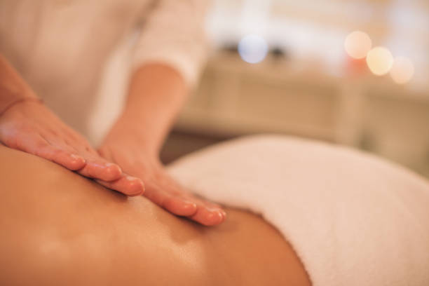 istock Young woman enjoying massage 1085027726