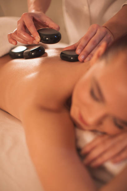 istock Young woman enjoying massage 1085027884