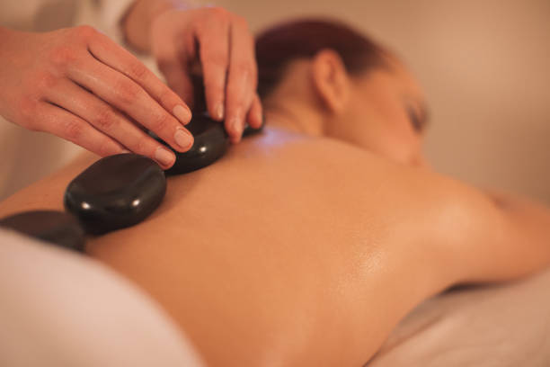 istock Young woman enjoying massage 1085029332