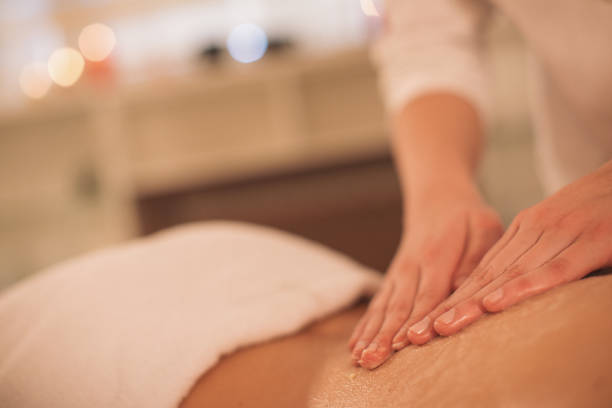 istock Young woman enjoying massage 1085029480