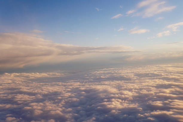 istock Sunset above the clouds landscape from an airplane journey 1085029614