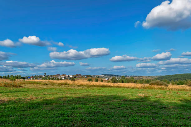 istock Rural landscape with haystacks in a summer sunny day. 1085039002