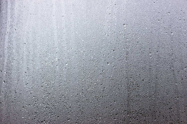 istock water drops on window glass 1085043358