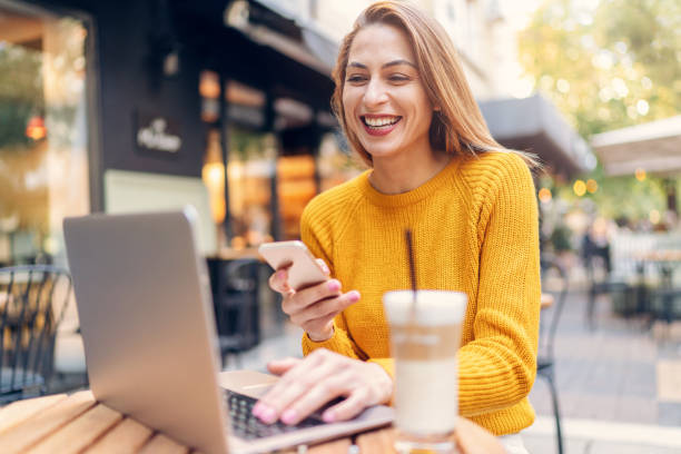 istock Happy woman online 1085043586