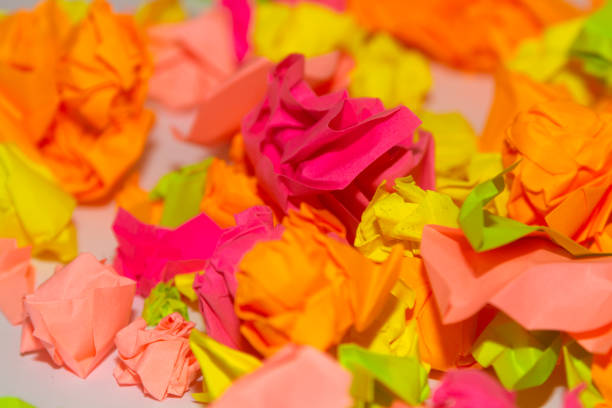 istock Bright crumpled multi-colored stickers on the office white board. 1085046866