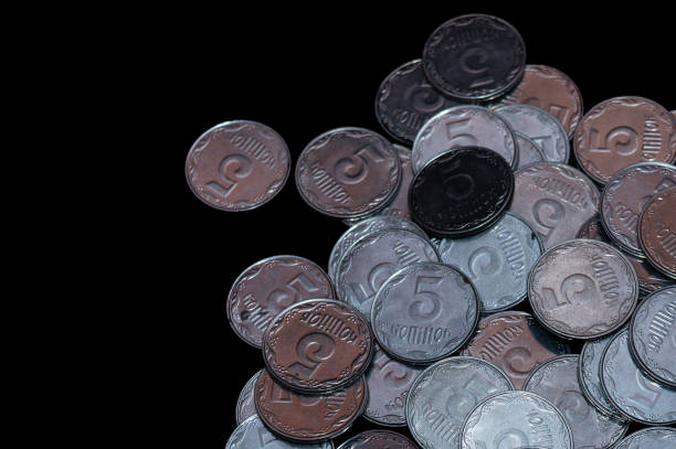 istock Small Ukrainian coins isolated on black background. Close-up view. 1085048548