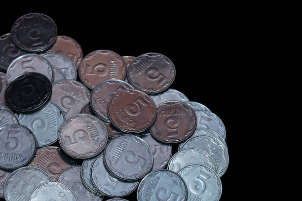 istock Small Ukrainian coins isolated on black background. Close-up view. 1085048564