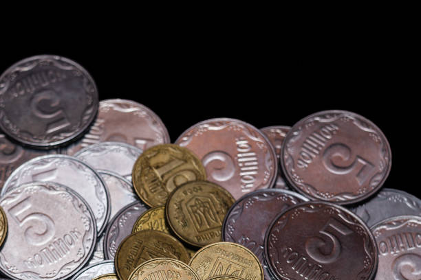 istock Small Ukrainian coins isolated on black background. Close-up view. 1085048620