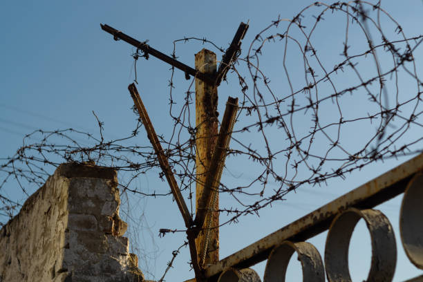 istock Barbed wire of the military unit 1085049150