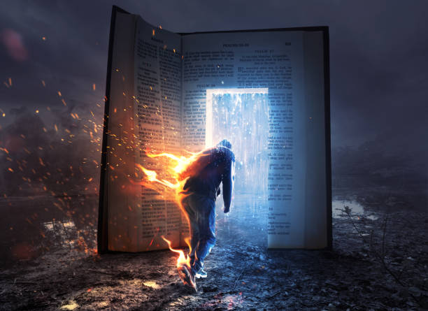 Fire and water book A man on fire runs towards an open Bible with refreshing rain. hell stock pictures, royalty-free photos & images