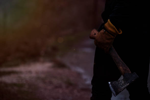 istock A man holds an ax in his hands against 1085056812