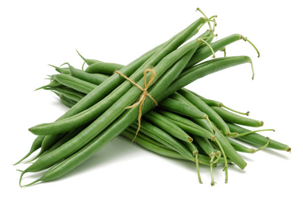 istock Bundle of green beans isolated on white background 1085061712