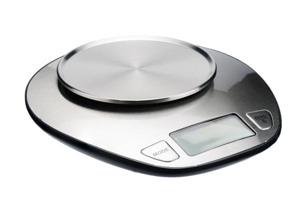 istock An electronic scale without a measuring cup isolated on white background. 1085063444