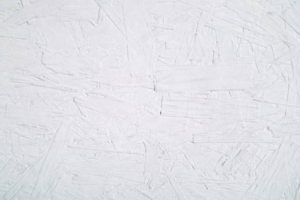 istock Texture of wood chipboard painted white background 1085063858