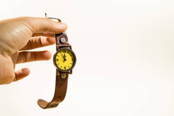 istock wrist watch in hand 1085065838