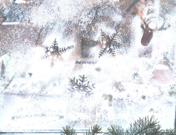 istock Winter pattern of snowflakes on the window.  Copy space. 1085066440