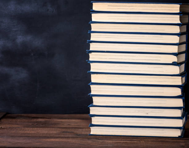 istock large stack of books in a blue cover 1085074220