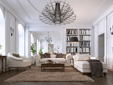 Interior clásico de lujo de sala de estar y comedor con muebles blancos y lámparas de metal. photo