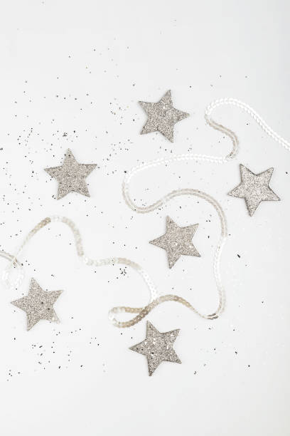 istock Christmas balls, pink and silver decorations on white background. 1085081500