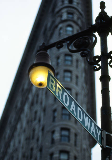 istock Flatiron Building with Broadway road sign 1085096350