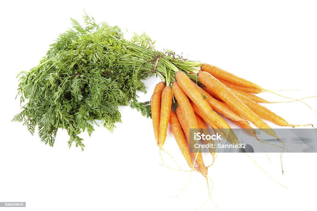 bunch of fresh carrots bunch of fresh carrots isolated on white background Bunch Stock Photo