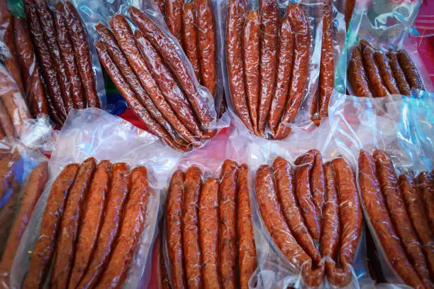 Photo of pile of chinese sausage background /  Chinese Pork Sausages (Gun-chiang) in street food
