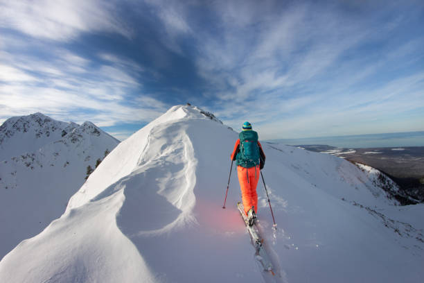 istock A skier walks in the mountains 1085139016