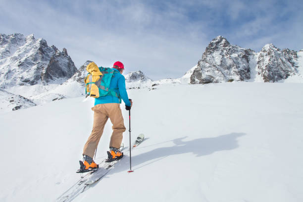 istock A skier walks in the mountains 1085139020