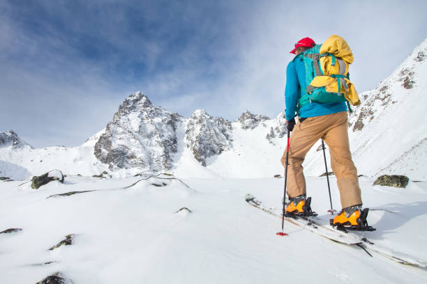 istock A skier walks in the mountains 1085139022