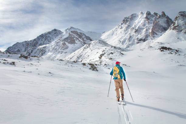 istock A skier walks in the mountains 1085139044