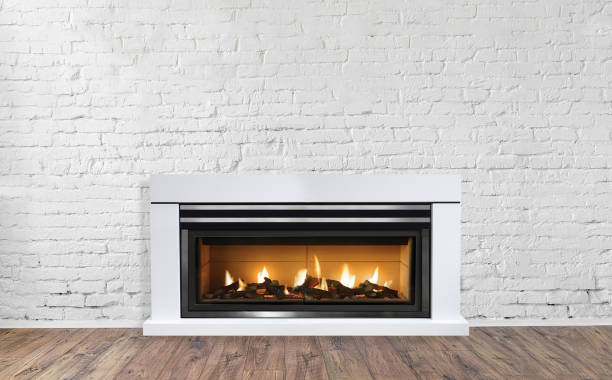 istock White Fireplace in bright empty living room interior of house 1085140962