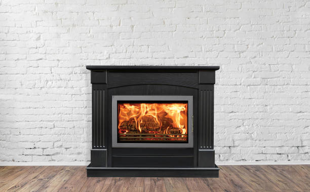 istock Fireplace in bright empty living room interior of house 1085140988