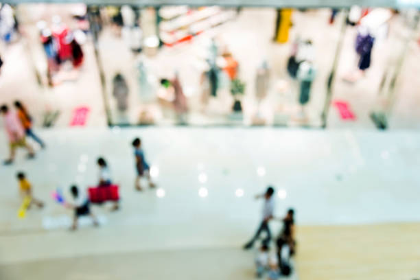 istock Blurred background of shopping mall 1085143124