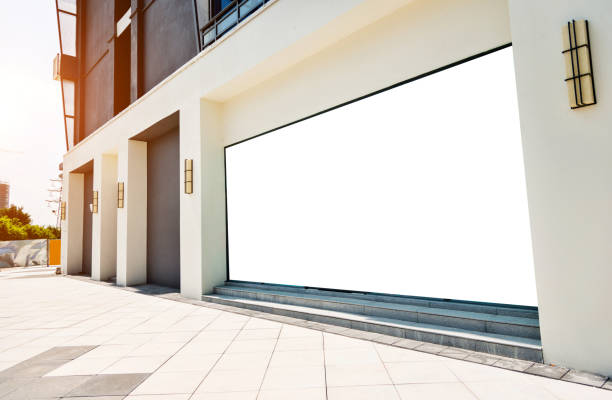 Blank billboard on office building wall Blank billboard on office building wall. store wall surrounding wall facade stock pictures, royalty-free photos & images