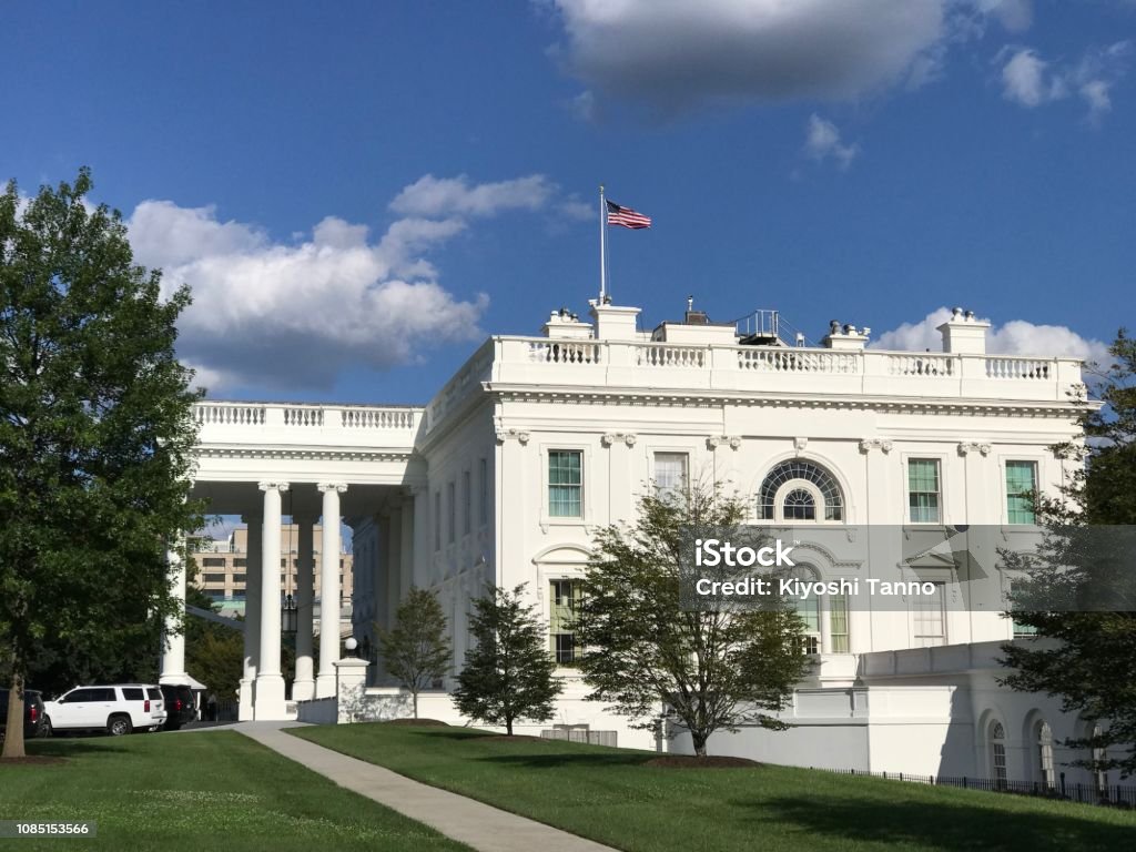 White House west side in front of live spot. Capital Cities Stock Photo