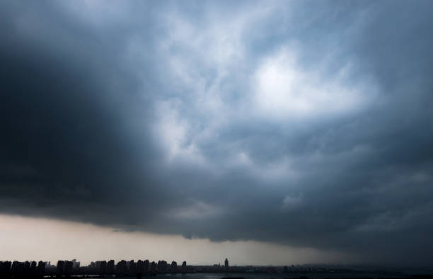 istock Dark storm clouds over the seaside city 1085153606