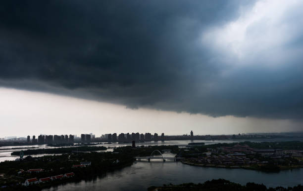 istock Dark storm clouds over the seaside city 1085153632
