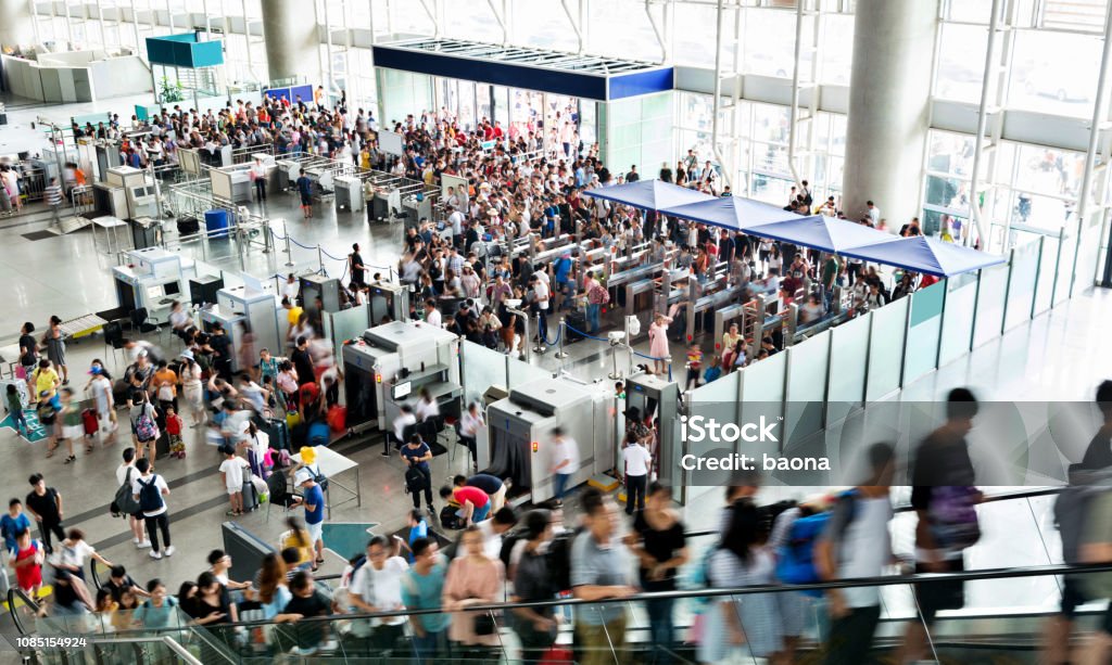 Crowd of people on railroad station lobby Crowd of people on railroad station lobby. Airport Stock Photo