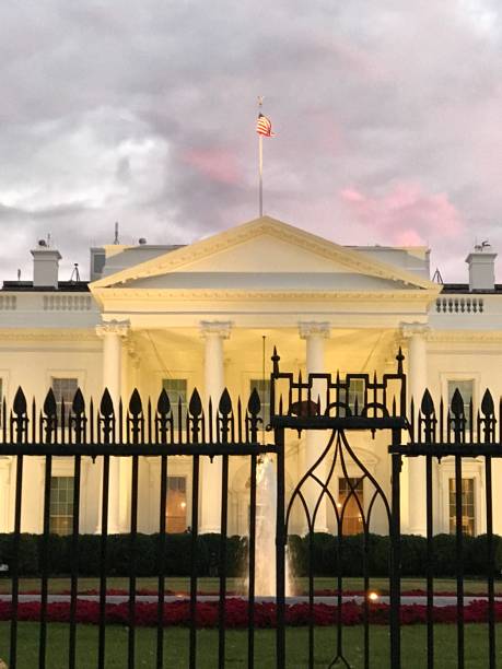 istock Light up White House and Pink SKY 1085155736