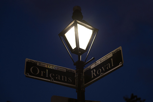Orleans and Royal street sign and lamp in the French quarter.