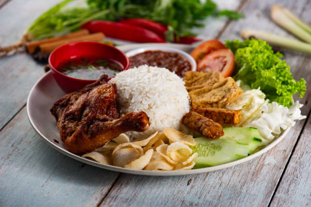 istock indonesian traditional rice with chicken 1085164350