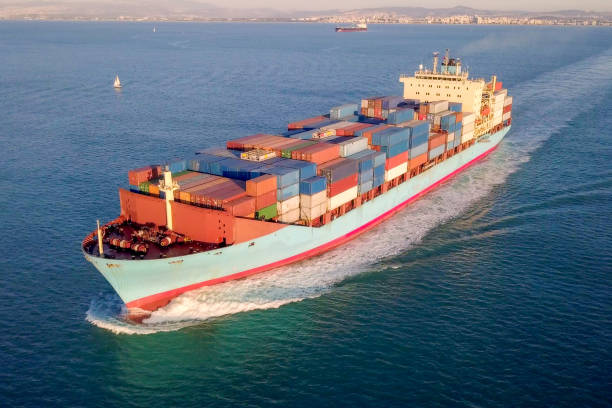 istock Large container ship at sea - Aerial image 1085167244