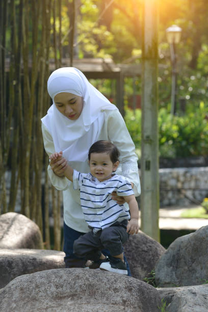 istock musim mother and child playing 1085168712