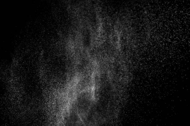 istock abstract splashes of water on a black background. 1085175812