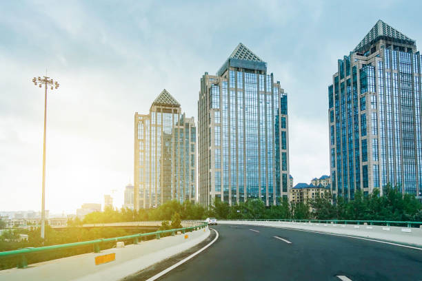 istock modern city road flyover and office buildings 1085178852