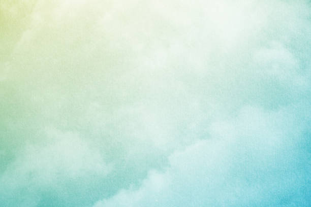 istock fantasy cloudy sky with pastel gradient color and grunge texture , nature abstract background 1085187988