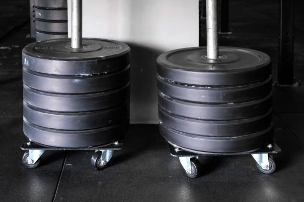 Close up weight plates stacking at the gym