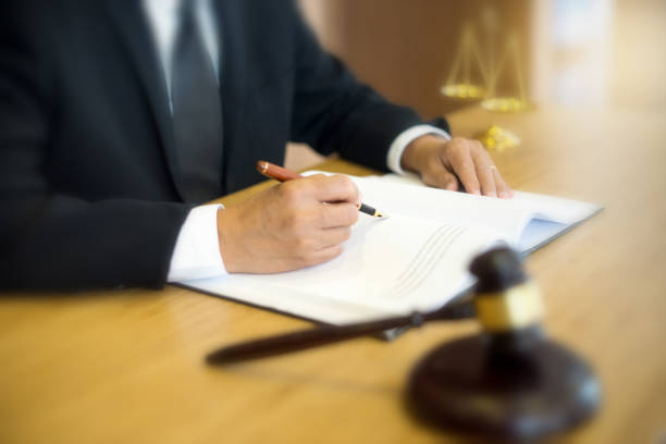 istock lawyer or  judge work in the office with gavel 1085192450