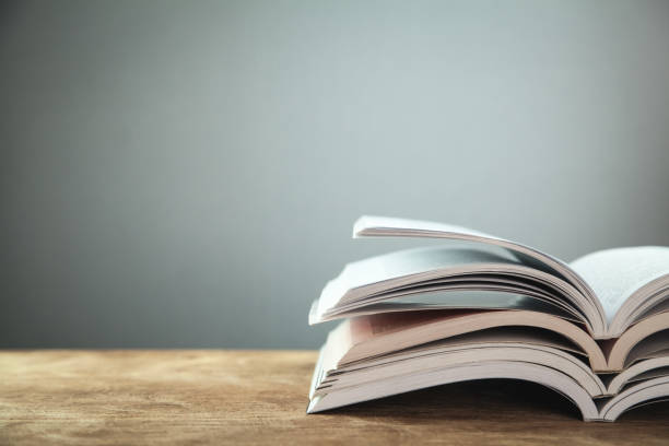 istock Open books on wooden table. Education concept 1085197792
