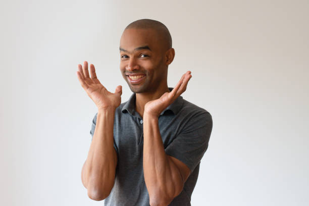 istock Amazed dark skinned guy overjoyed with good news 1085204606